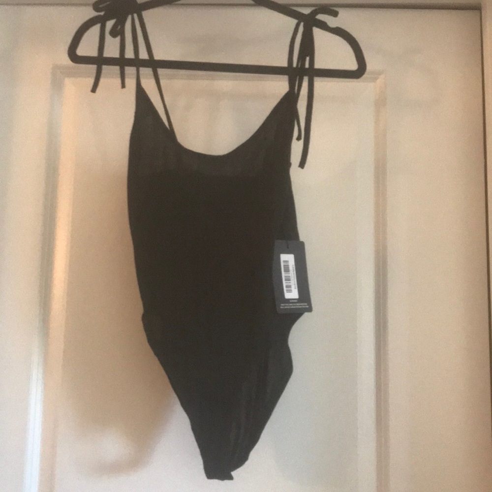New with tags black body suit!